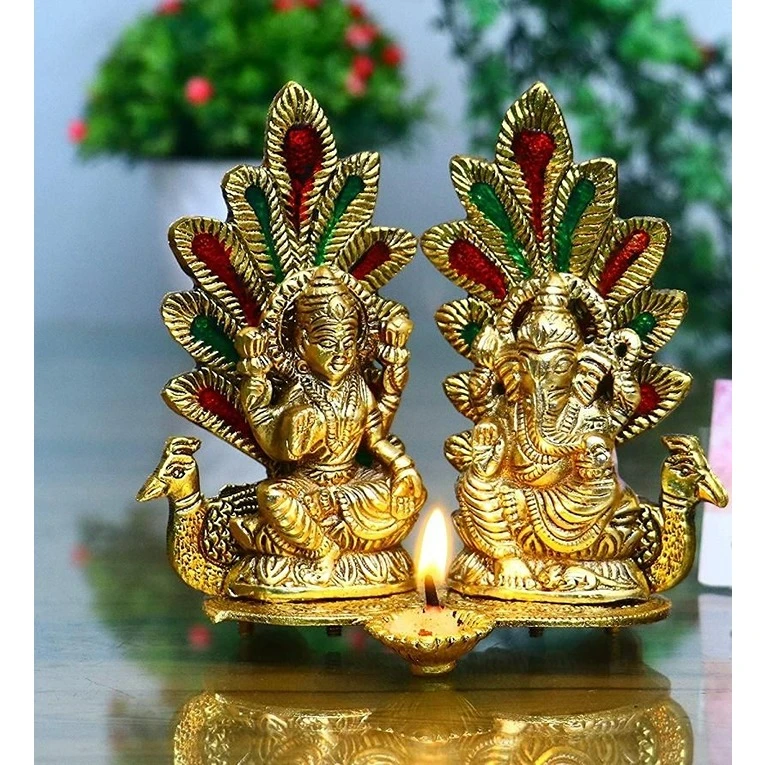 Laxmi-Ganesh-Idol-Statue-with-Diya-Peacock-Showpiece.jpg